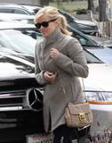 th_46407_celebrity_paradise.com_TheElder_ReeseWitherspoon2011_03_23_atBrentwoodCountryMart4_122_18lo.JPG
