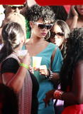 Rihanna - Side-Boob @ Reggae On The Hill in Barbados 4/26 (ADDS)