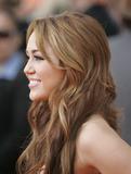 http://img250.imagevenue.com/loc82/th_07622_celebrity_paradise.com_TheElder_MileyCyrus10_122_82lo.jpg